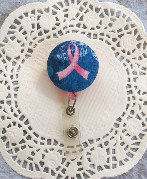 Pink and blue breast cancer badge reel