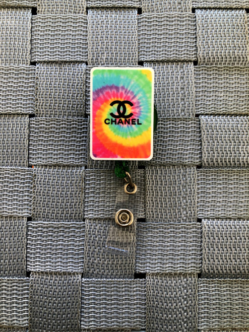 Tye dye planar badge reel c.