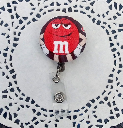 M&M Red badge reel