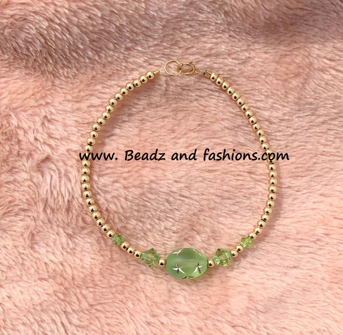 14k gold August oval stardust bracelet