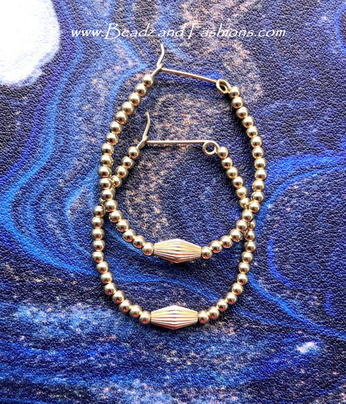 14k All gold Large torpedo hoop earrings