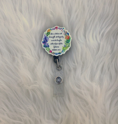 Clothed with strength badge reel