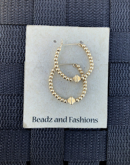 14k All gold Medium shell earrings