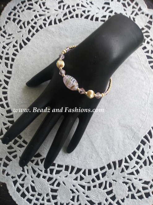 14k gold filled pink swirl bracelet