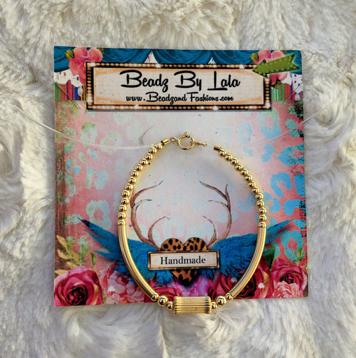 14k All gold tunnel skinny bangle kids #1