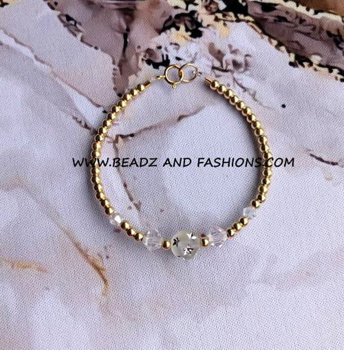 14k gold April stardust bracelet kids.