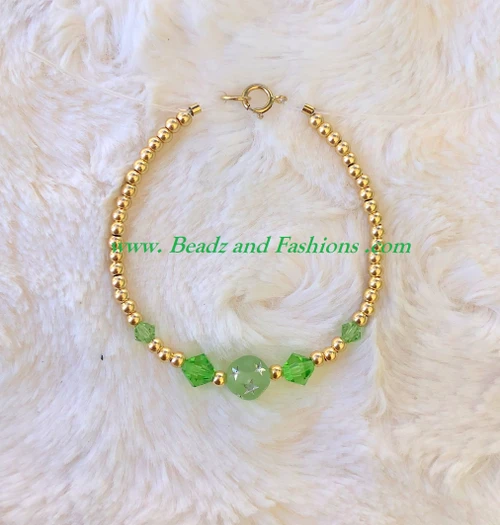 14k gold August stardust bracelet kids.