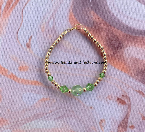 14k gold August stardust bracelet kids.