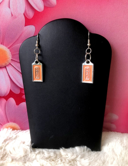 Pink tag dangle earrings