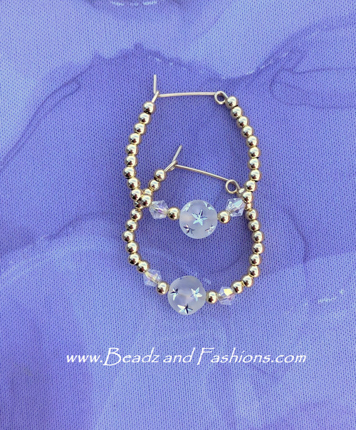 14k gold Clear Medium stardust hoop earring.