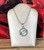 JETS Round charm necklace