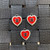 Red heart metal charm.