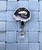 Rams lips  planar badge reel