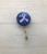 Pink and blue breast cancer badge reel