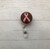 Pink and brown breast cancer badge reel