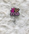 CNA pink leopard badge reel