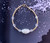14k gold clear oval swirl bracelet