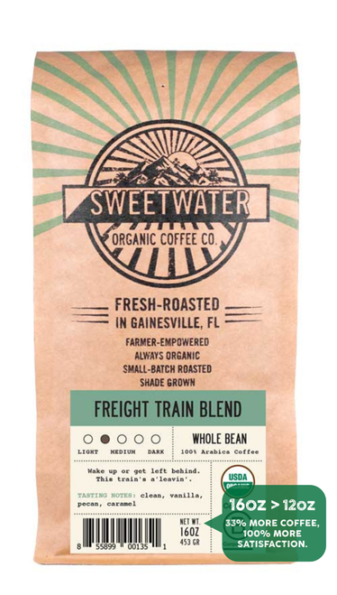 16 oz bag of Freight Train Blend fair trade, organic, shade grown coffee. Badge reads: 16oz is greater than 12oz, 33% more coffee, 100% more satisfaction.