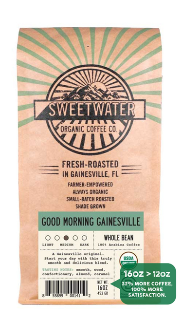 16 oz bag of Good Morning Gainesville Blend fair trade, organic, shade grown coffee. Badge reads: 16oz is greater than 12oz, 33% more coffee, 100% more satisfaction.