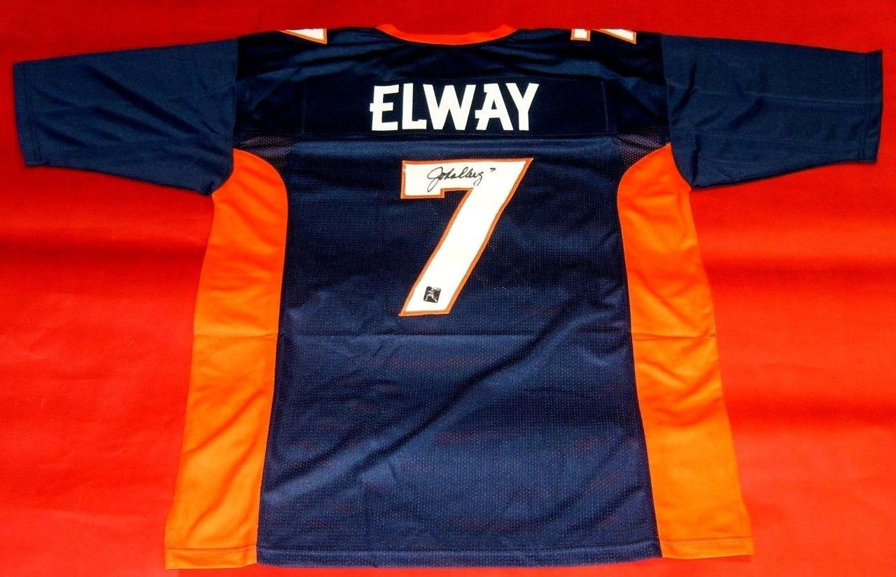 JOHN ELWAY AUTOGRAPHED DENVER BRONCOS JERSEY JE HOLOGRAM Autographed John  Elway Custom Style Denver Broncos Jersey. John inscribed the jersey with  “7” for his jersey number. All Letters and Numbers are stitched