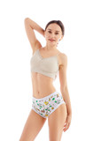 Female model wearing training pants, front-view.