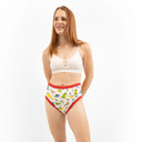 Female model wearing adult training pants, front-view.