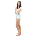 Female model wearing adult diaper, side-view.