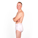 Male model wearing InControl BeDry Night Premium Briefs, side-view.