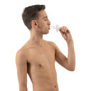 Male model using Adult Pacifier, side-view.
