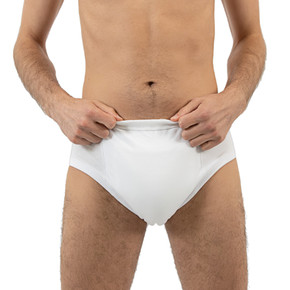 Front-view of modeled white training pants.
