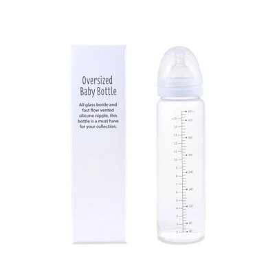 White adult bottle with cap beside box.