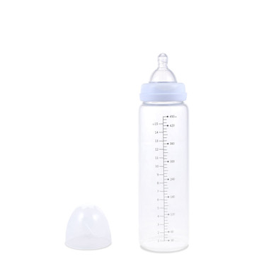 Vintage white adult bottle with dust cover off to the side.