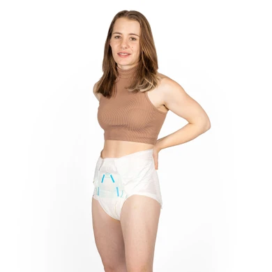 Female model wearing BeDry Premium Incontinence Briefs, front-view.