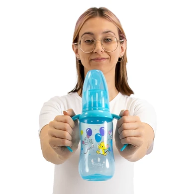Female model holding Daydreamer adult bottle.