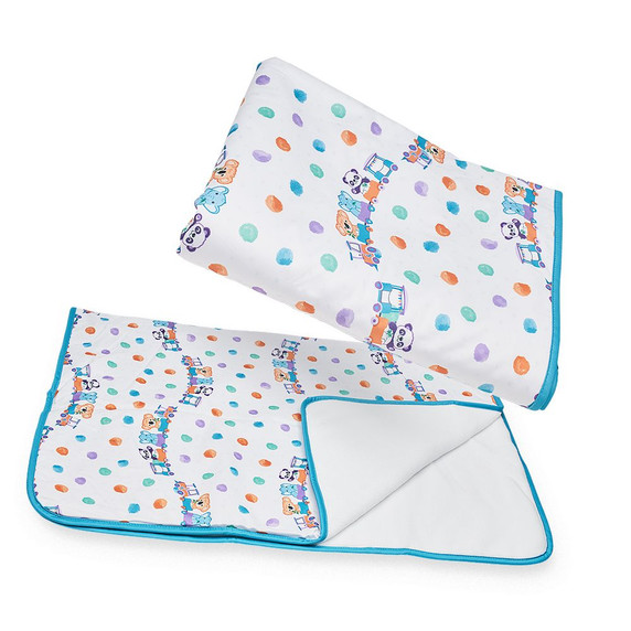 Folded Critter Caboose absorbent change pads.