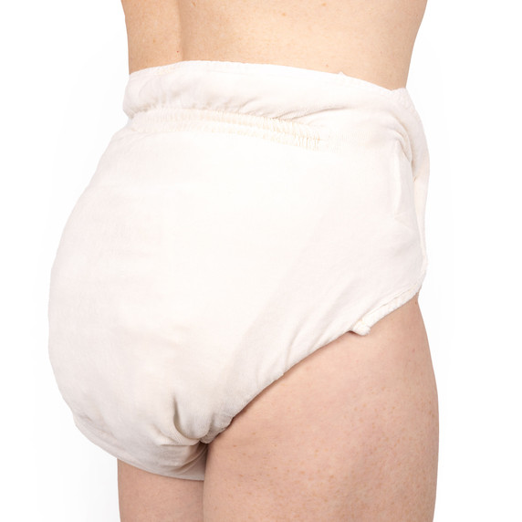 Male wearing Omutsu Waddle Cloth Diaper, showcasing the back of the diaper fit on body.