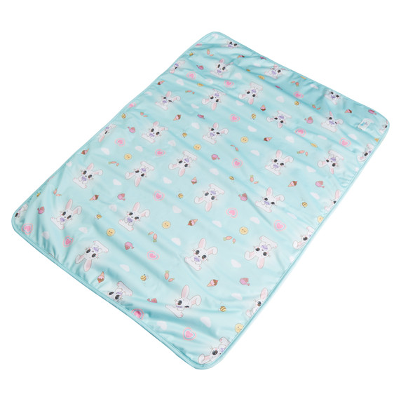 Absorbent change pad lying flat.