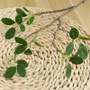 Green Eucalyptus Leaf artificial plant branch on woven wicker base, 46cm, for home or wedding decoration.