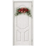 30-inch Artificial Peony Eucalyptus Swag on a white door, featuring red flowers and green leaves.