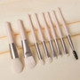 Soft Fluffy Makeup Brushes Set of 8pcs, white handles, silver ferrules, various brush head sizes and shapes.