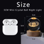 Common Good 5cm Crystal Ball Lamp, glowing galaxy night light with planets and moon design.