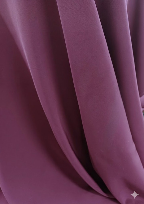 Cady Stretch Suiting Fabric by Milly, a 90/10 Poly-Lycra blend from Italy, draped to show its texture.