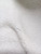 White Sherpa Faux Fur fabric with a dense, curly pile and soft lambswool texture.