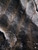 Macro close-up of luxury espresso brown faux mink fabric, showing dense plush pile with realistic silver-tipped guard hairs and a silky, high-luster finish.