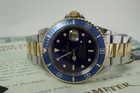 Rolex 16613 Submariner tutone w/ box, papers & tag dates 1991 modern automatic original stainless steel 18k yellow gold pre owned for sale houston fabsuisse