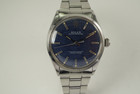 Rolex 1002 Oyster Perpetual stainless steel blue mosaic dial dates 1970 vintage pre owned for sale houston fabsuisse