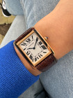A very nice preowned Cartier Tank Solo reference 3167 in 18k rose gold , crafted during the mid 2000s.  An enduring classic with simple rectangular softly edged case housing a silvered dial and black Roman numeral hour markers with inconspicuous Cartier logo at 7 o’clock, inner black minute track and blued-steel sword-shaped hands and blue spinel beaded crown. Paired with the brown alligator strap, will suit a variety of settings, sitting comfortably on the wrist with its 5.5 mm silhouette.

Original polished case shows minimal wear,
Original dial, hands and Cartier crown.
Sapphire crystal.
Case measures 27.5 x 35mm, 5.5 mm thick.
Cartier quartz movement, 7 jewels.
Serial# 74211xxx
Cartier brown alligator strap (85% condition approximation).
Cartier 18k rose gold tang buckle.
20mm lug width.