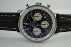 BRAND:                            Breitling 
MODEL:                            Navitimer  
CASE MATERIAL:            Stainless steel
CASE MEASURES:          41 x 48 mm
MOVEMENT:                     Automatic
FUNCTIONS:                    Chronograph and date 
CONDITION:                     Excellent
See it in our eBay store.
A modern preowned Breitling Navitimer in stainless steel, crafted circa 2010. Commands a bold presence on the wearer’s wrist, with its large 41 mm case and black and white chronograph dial, the blue antireflective film catching the light at times. Modeled on size 6 inch wrist. 

Breitling books, certificates and slide rule.
Original dial, hands and crown.
Case measures 41 x 48 mm, 9mm thick.
Breitling cal. 7753-24 automatic winding.
Serial# 2242xxx
Sapphire crystal.
Breitling black leather strap (% condition)with deployment buckle .
Breitling black leather strap with buckle, unworn.
22 mm lug width.