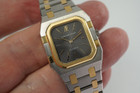 A fine Audemars Piguet Royal Oak in 18k yellow gold and stainless steel, crafted during the 1980s. The smaller rectangular case with the dark grey tapestry dial provides a minimal look, elevated by the gold accents beautifully catching the light. Perfect for casual or dressy affairs, and  wears flush on the wrist for a comfort fit. Modeled on 6 inch wrist. 

Original brushed finish on case and bracelet.

6mm thick case.

Audemars cal. jeweled quartz.

Serial# B60xxx

Audemars bracelet fits 5 7/8 inches or 15cm approximate.

18mm lug width. 

A new battery has been installed by our watchmaker.