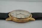 BRAND:                          Patek Philippe
MODEL:                          Calatrava
CASE MATERIAL:           18k yellow gold
CASE MEASURES:          33 x 39 mm
MOVEMENT:                   Automatic
FUNCTIONS:                   Time
CONDITION:                    Fine
See it in our eBay store.

A fine vintage Patek Philippe Calatrava reference 3591, crafted during the 1970s. A classic from Patek’s popular model featuring a thin profile housing an automatic movement, silver-tone dial with black marker hands and Roman numerals, and subtle stepped bezel. Suitable for all occasions. Modeled on 6 inch wrist.

Toning on case.
Original dial, hands and crown. 
Case measures 33 x 39 mm, 6.5 thick.
Patek cal., 28-255, 36 jewels automatic. 
2 seals of Geneva.
Movement# 12813xx Case# 5220xx
Sapphire crystal.
Patek black lizard strap (80% condition approximate).
Patek gold buckle. 
18mm between lugs.